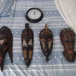 African Mask And Clock