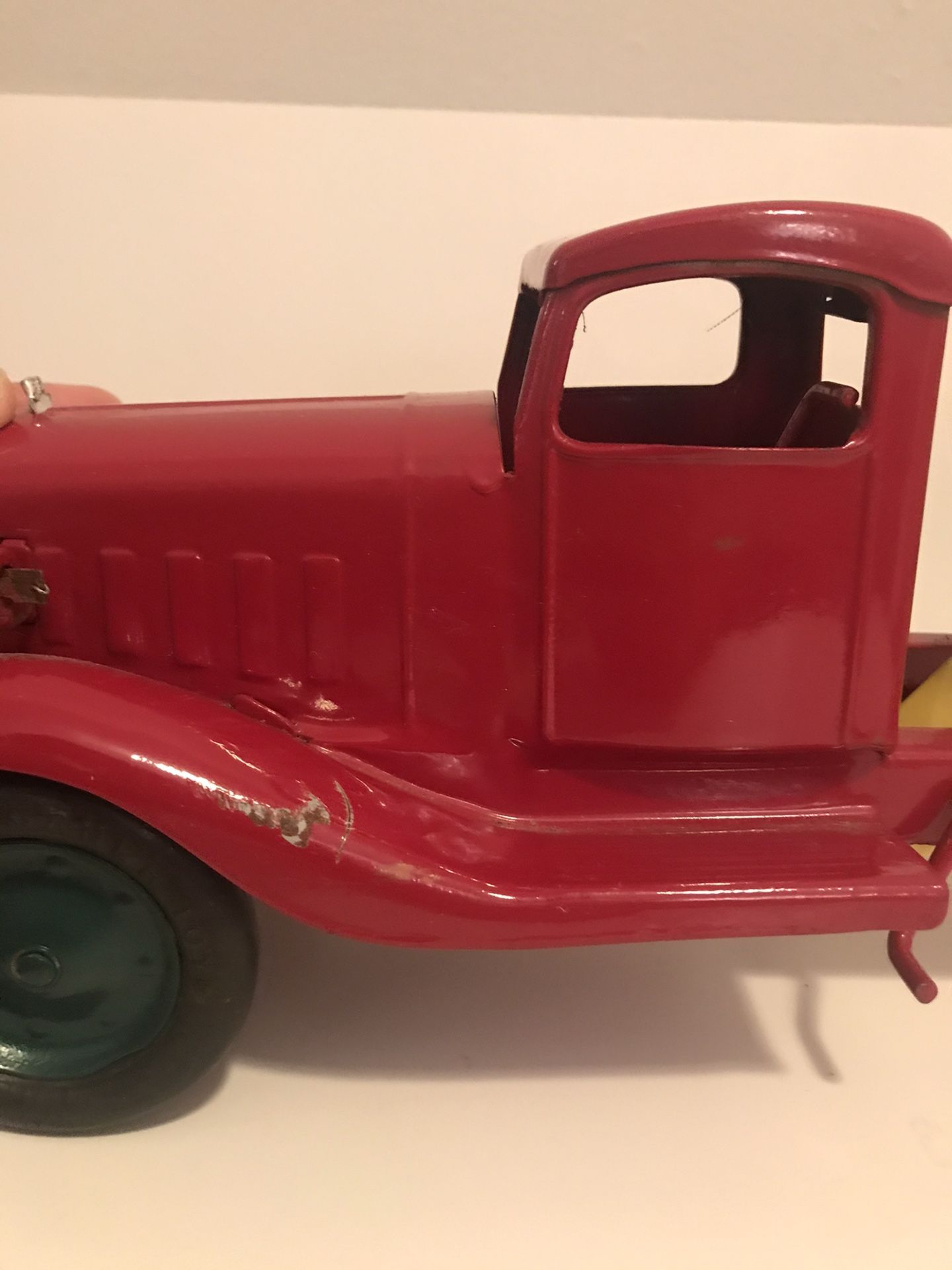 Vintage and Rare Turner Toys Pressed Metal Red and Yellow Dump Truck with Battery Slot for Working Headlights 18in Length 6in Height Normal Wear Rubb