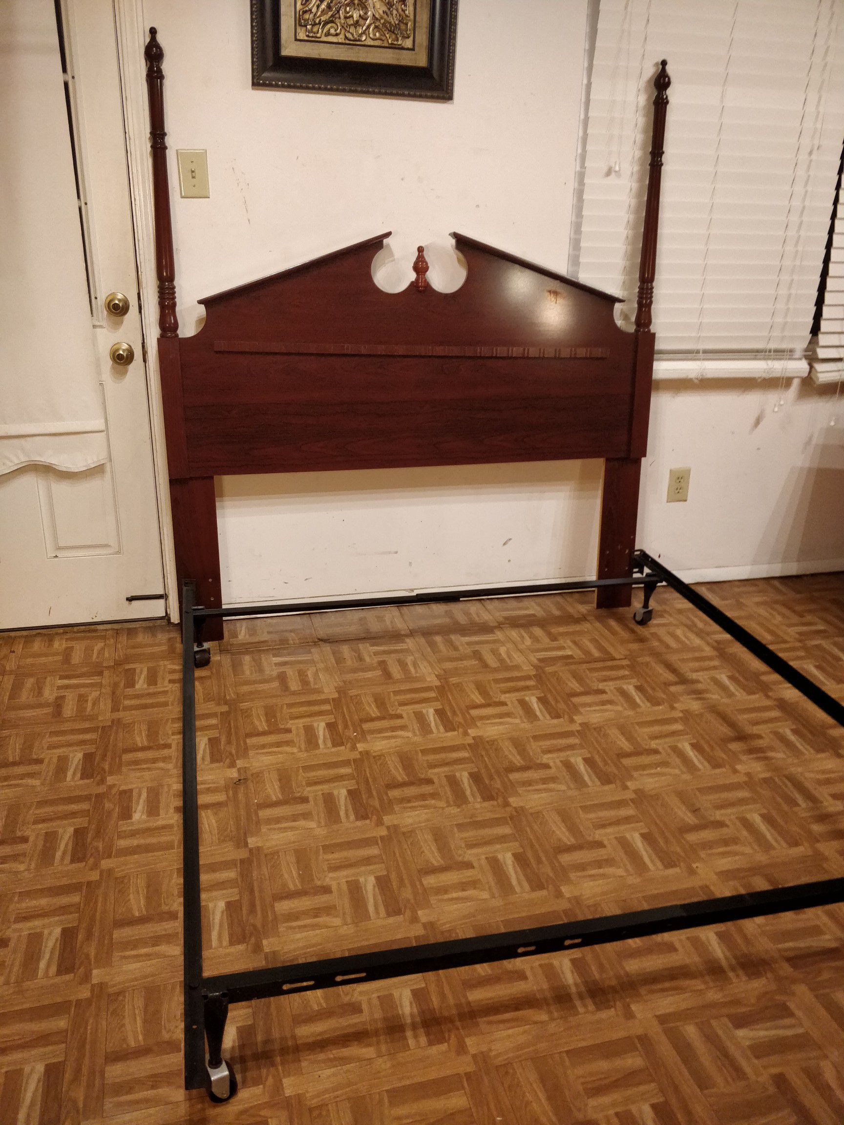 Like new solid wood queen/full size headboard in great condition with metal box spring base, pet free smoke free.