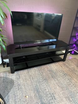 Black metal TV Stand with Three Glass Shelves