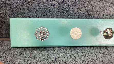 Board with 4 hook buttons