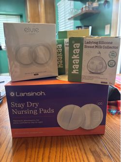 Breastmilk catching cups (Elvie, Hakaa) and Lanisoh nursing pads