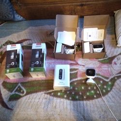 Xfìnity Security Camera,  Door Bell, Smart Locks 