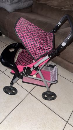 Little girl, baby stroller