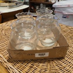 4  matching glass bowls