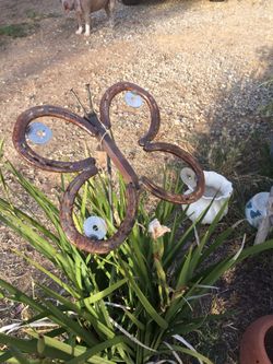Rustic horseshoe garden butterfly