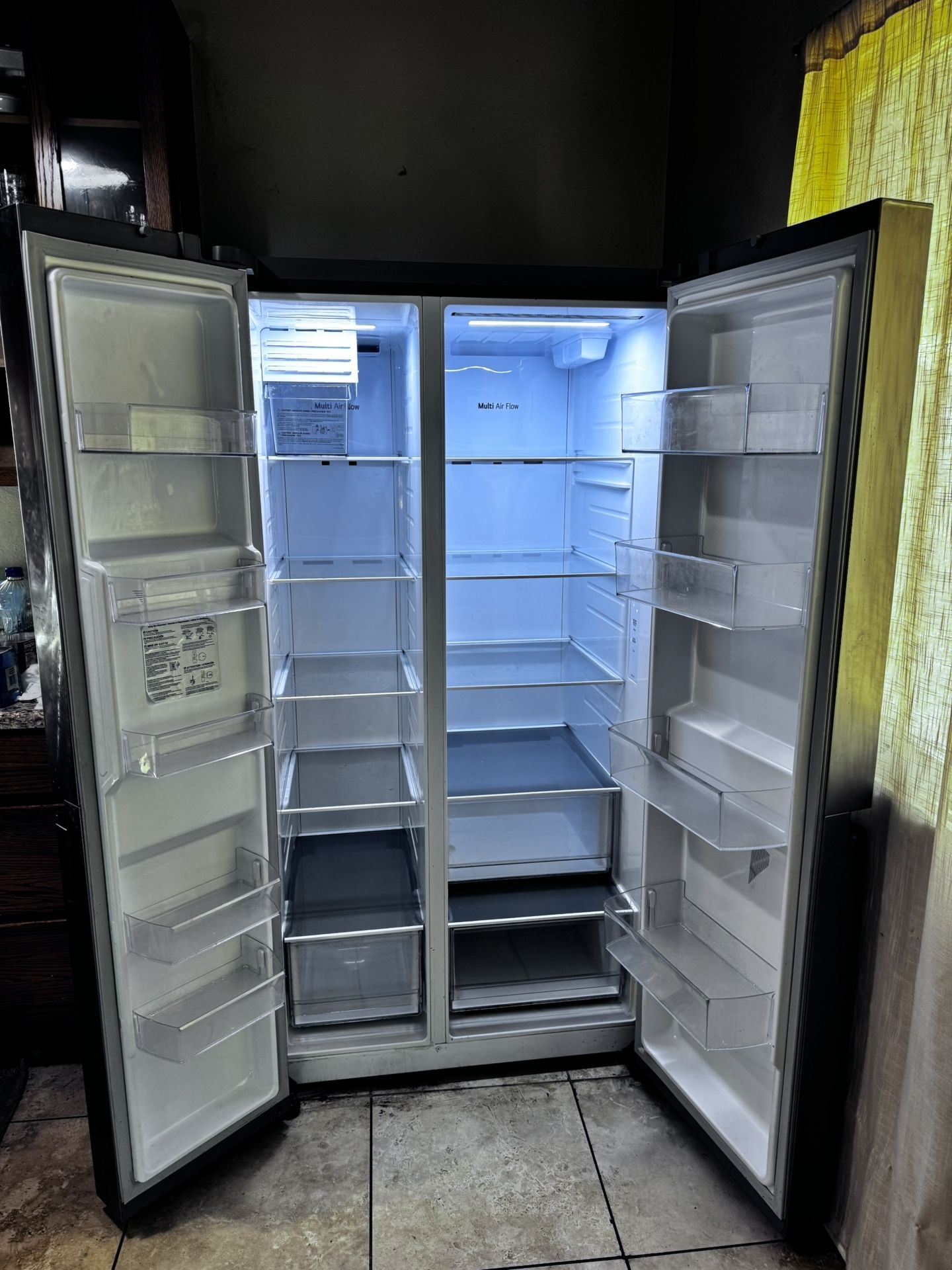 LG 27.6-cu ft Side-by-Side Refrigerator with Ice Maker and Water Dispenser (Printproof Stainless Steel