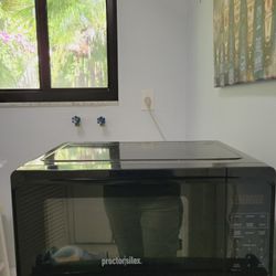 Black Microwave, Used Only 1 Year, 16" Long.