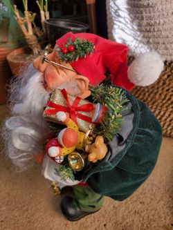 Very detailed Vintage Santa with bag of presents and Nice list