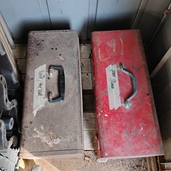 Tool boxes with tools.