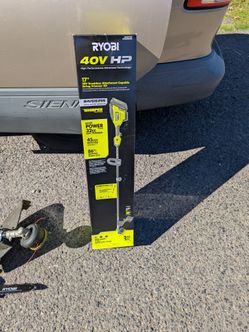 Ryobi 40 volt HP string trimmer plus attachment +pole saw, plus battery plus charger 17 in