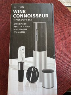 Rechargeable wine bottle opener with accessories