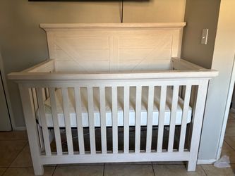 Baby crib with mattress