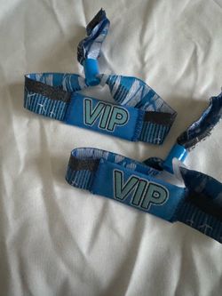 Two VIP head trip wristbands for sale