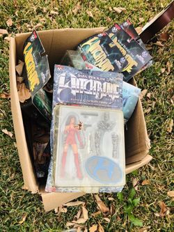 Box of Collectible Action Figures