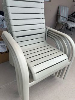 Five patio chairs