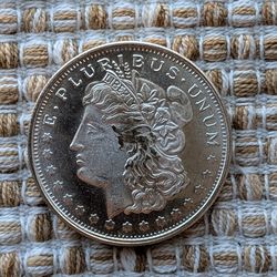 1 oz .999 silver round Morgan design