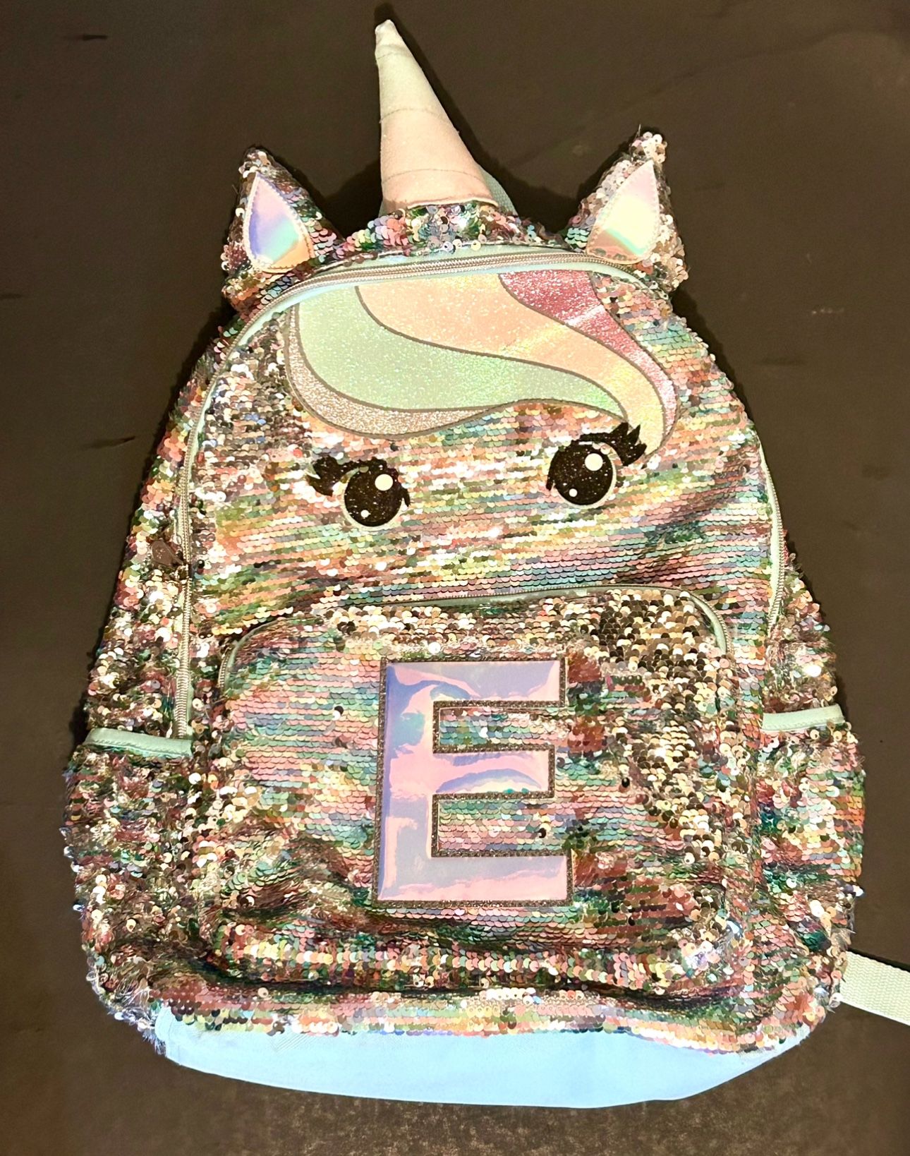 Shimmering flip sequin finish with magical unicorn embellishments