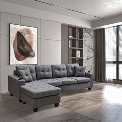 BRAND NEW SECTIONAL COUCH WITH CUP HOLDERS