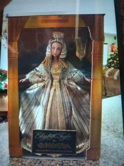 Barbie doll , elizabeth taylor perfect , never been out of box eighty dollars