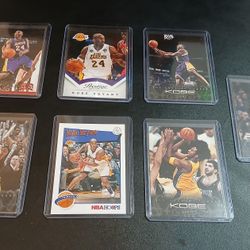 Kobe Bryant cards in hard protective cases. $10 each or $50 for all of them together. Mint condition