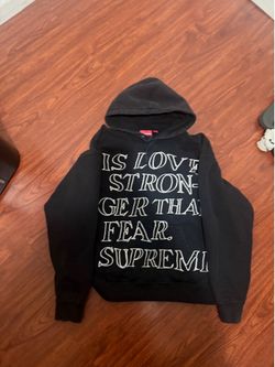 Black supreme hoodie “is love stronger than fear”
