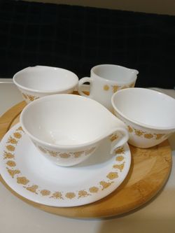 Corelle Pyrex butterfly gold three hooked handle cups one saucer Pyrex milk glass creamer. price is for all.