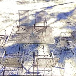 Wrought Iron Table and Six Chairs, RR