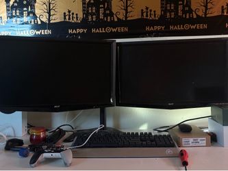 Double Monitors With Arms stand.