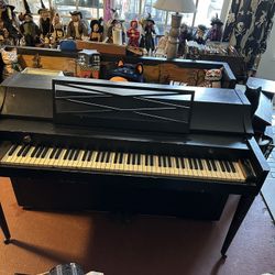 Baldwin Upright Piano On Rollers. In Tune