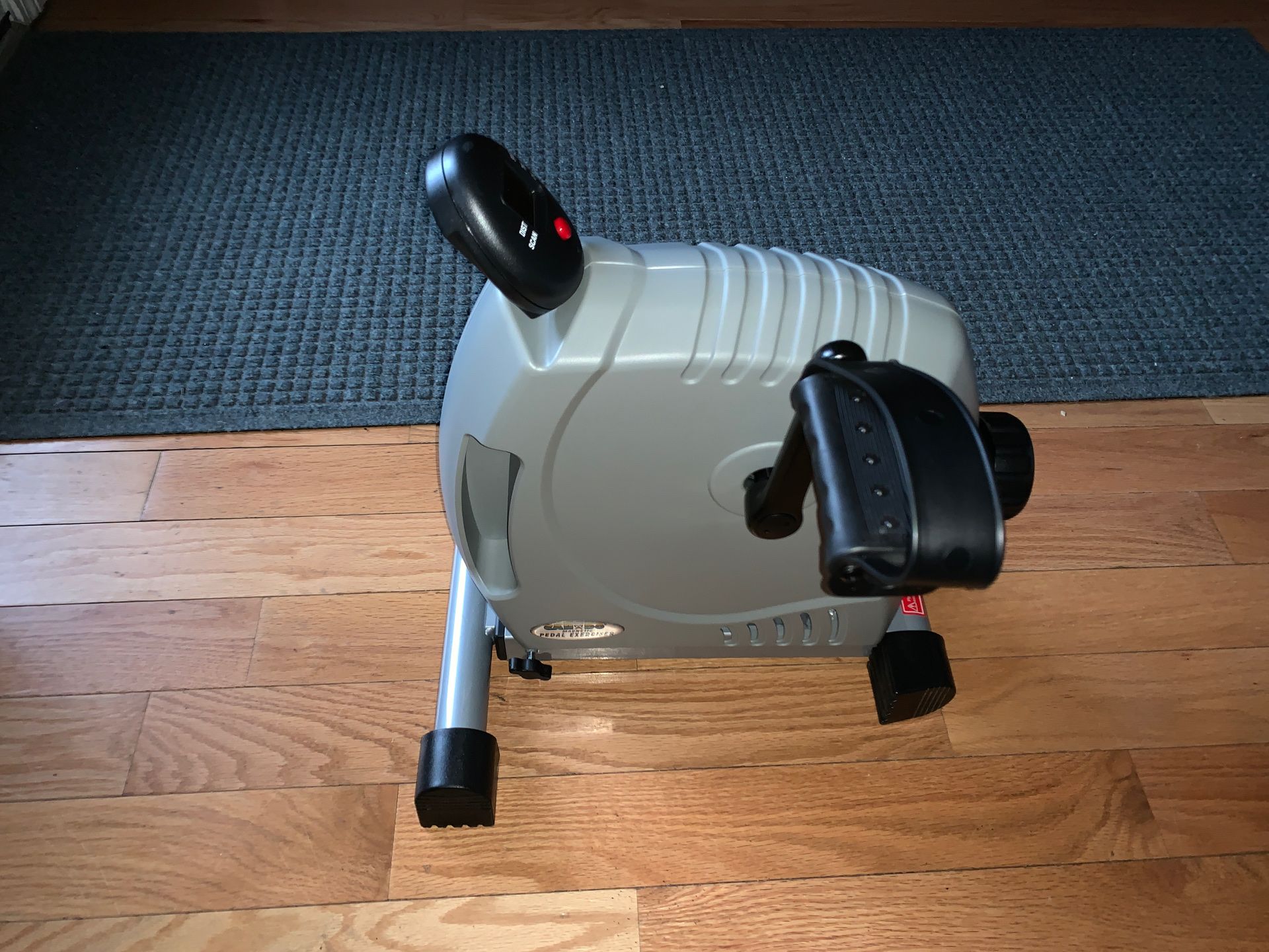 Pedal Exerciser. *BRAND NEW* never used. For range of motion. Can be used for arms and legs. Comes with hand/foot straps. Digital display shows speed