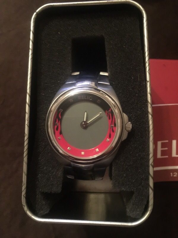 Relic men's watch with red and black flames.