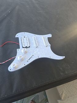Guitar pickguard loaded