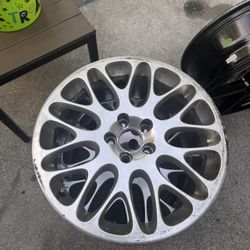 factory rims, likely from a Lincoln or Ford luxury sedan—possibly from a Lincoln MKZ, MKX, or older Ford Taurus or Fusion Limited trim.
