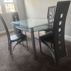 Table And 4 Chairs 