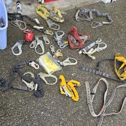 Set of two-piece fall arrest lanyard with rebar hook.