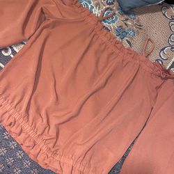 pink off the shoulder blouse size L