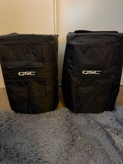 Pair of QSC K8’s with covers