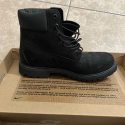 Black Timberland boots 
