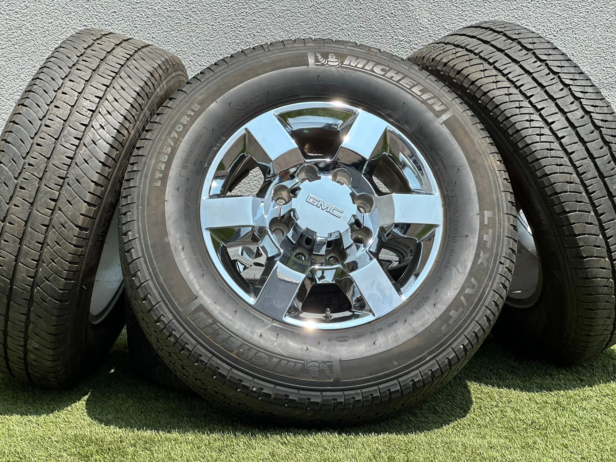 Chrome 18” GMC Sierra 3500 rims Sierra 2500 wheels A/T tires 8x180 Chevy Silverado High Country LTZ