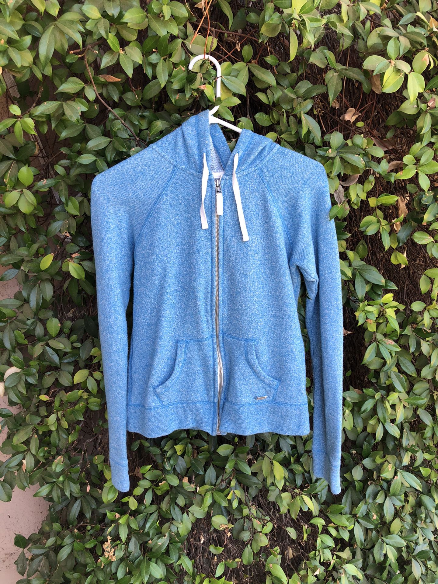 Size small blue zip up jacket