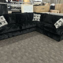 Thick And Comfy Black Sectional Couch  