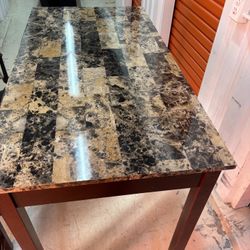 Table And Two Stools 