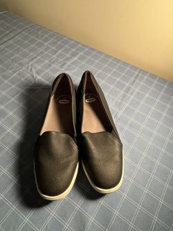 Comfortable black slip-on shoes by Dr. Scholl's. Size 7