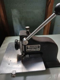 Geo T. Schmidt nameplate detail press. Model 4