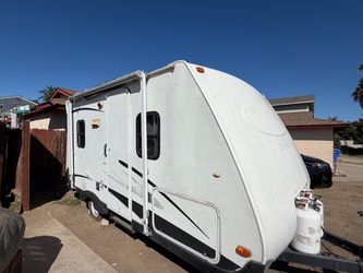 White Travel Trailer Zeppelin Camper 2004