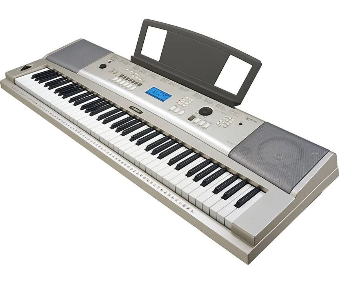 Yamaha piano With Music And Cover 