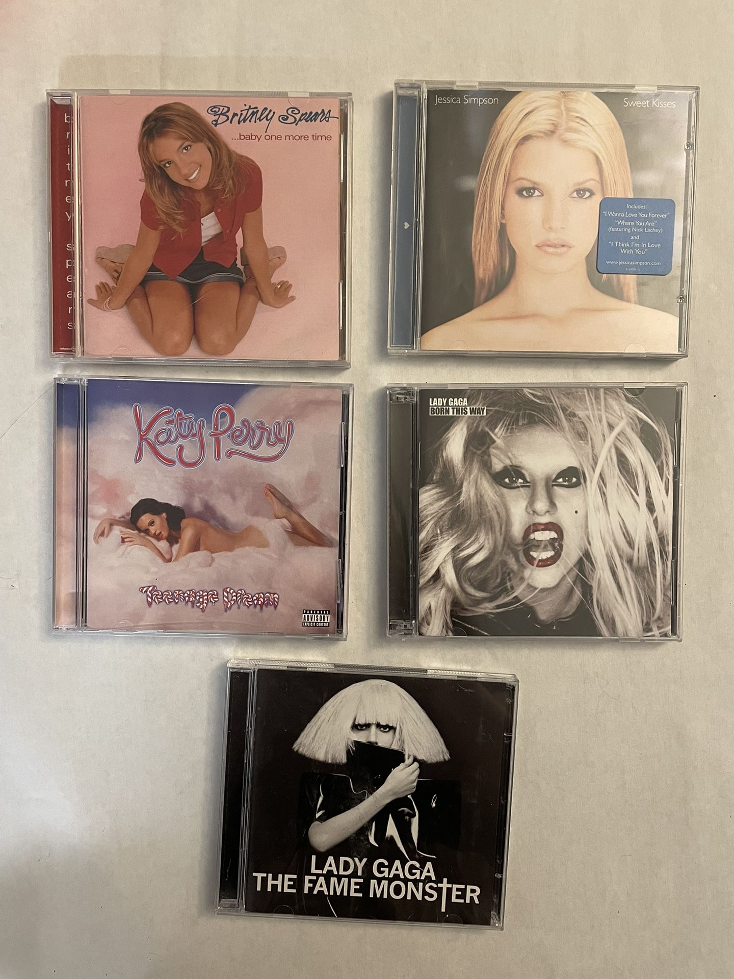 5 CDs - Britney Spears, Lady Gaga, Jessica Simpson, and Katy Perry