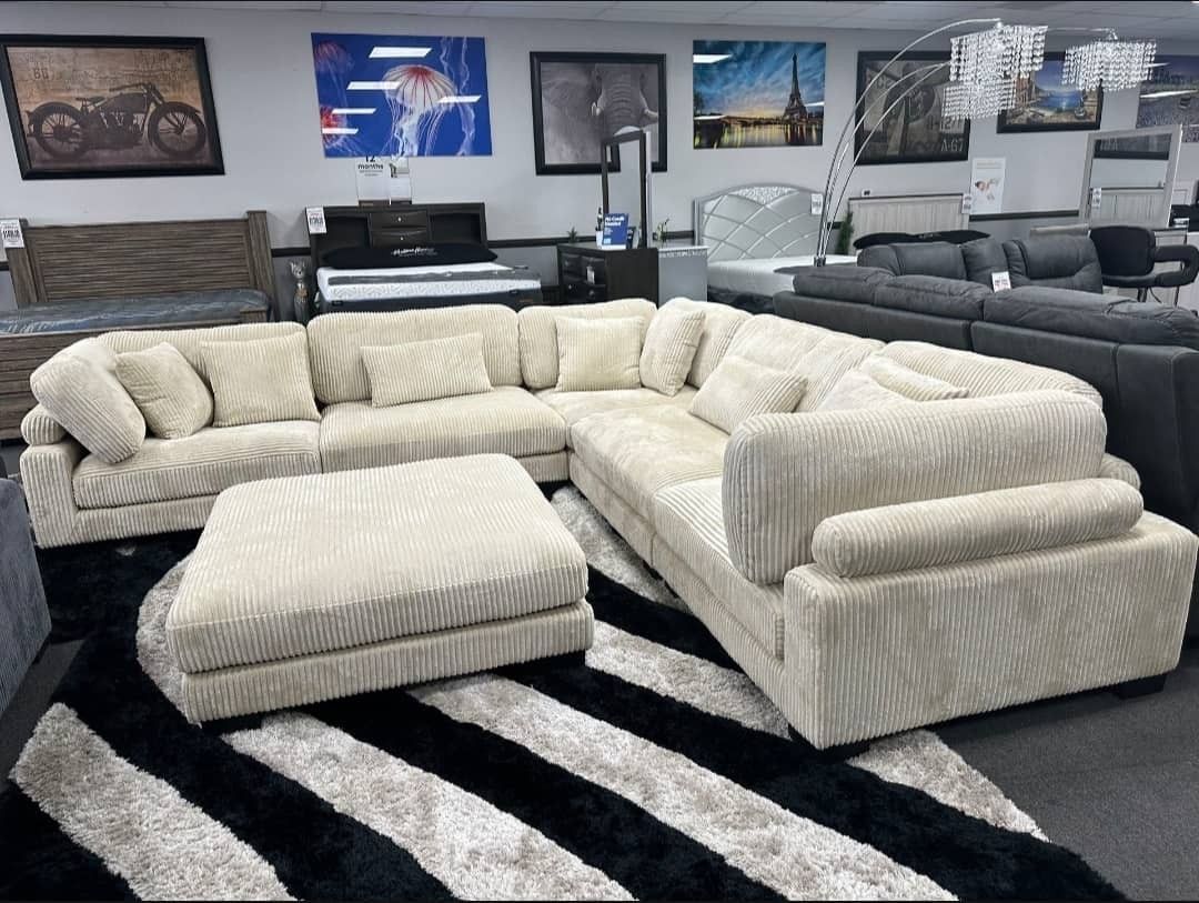 I am selling a modular sectional with an ottoman..Ask For Price. NOT FREE