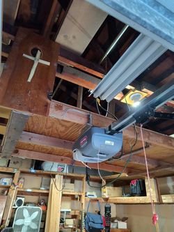 Overhead Garage Door Opener Spring Off Track Replace Adjustment And Parts